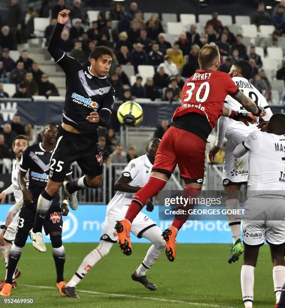 Bordeaux's Brazilian defender Nascimento Castro kicks the ball and scores during the French L1 football match between FC Girondins de Bordeaux and...