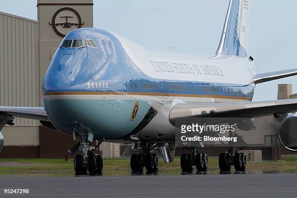 Air Force One with U.S. President Barack Obama on board arrives at Hickam Air Force Base in Honolulu, Hawaii, U.S., on Thursday, Dec. 24, 2009. The...