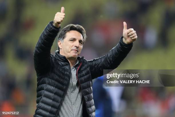 Amiens heaf coach Christophe Pelissier reacts at the end of the French L1 football match Monaco vs Amiens on April 28, 2018 at the Louis II sadium in...