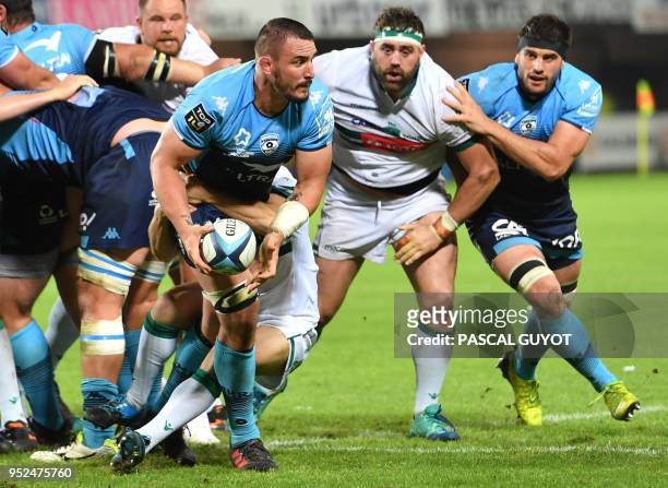 Montpellier's French flanker Louis Picamoles is tackled during the French Top 14 rugby union match between Montpellier and Pau on April 28, 2018 at...