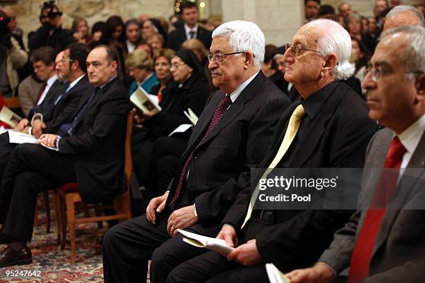 Palestinian president Mahmud Abbas, Victor Batarseh, Mayor of Bethlehem Palestinian Prime Minister Salam Fayad are taking part in Midnight Mass...