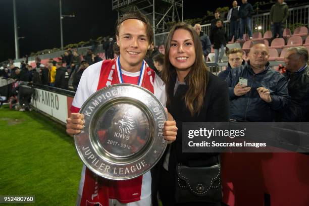 Gino Dekker of Ajax U23 celebrates the championship with the trophy and his girlfriend during the Dutch Jupiler League match between Ajax U23 v MVV...