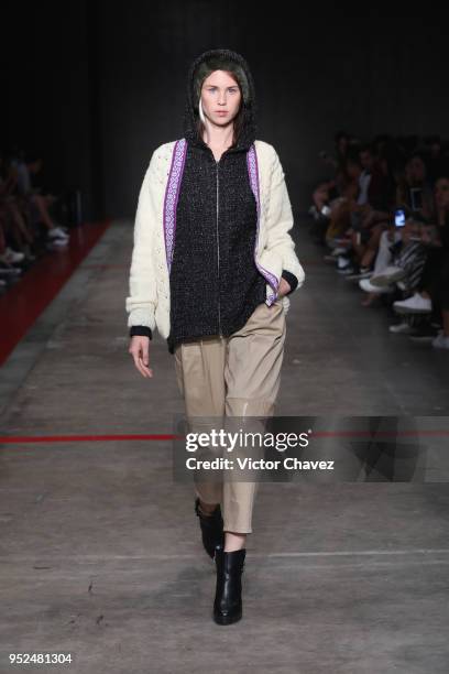 Model walks the runway during the Armando Takeda show at Mercedes Benz Fashion Week Mexico Fall/Winter 2018 at Fronton Mexico on April 26, 2018 in...