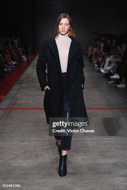 Model walks the runway during the Armando Takeda show at Mercedes Benz Fashion Week Mexico Fall/Winter 2018 at Fronton Mexico on April 26, 2018 in...