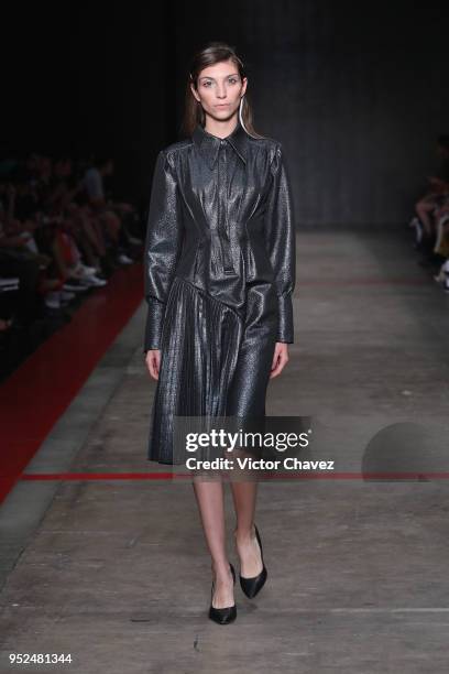 Model walks the runway during the Armando Takeda show at Mercedes Benz Fashion Week Mexico Fall/Winter 2018 at Fronton Mexico on April 26, 2018 in...