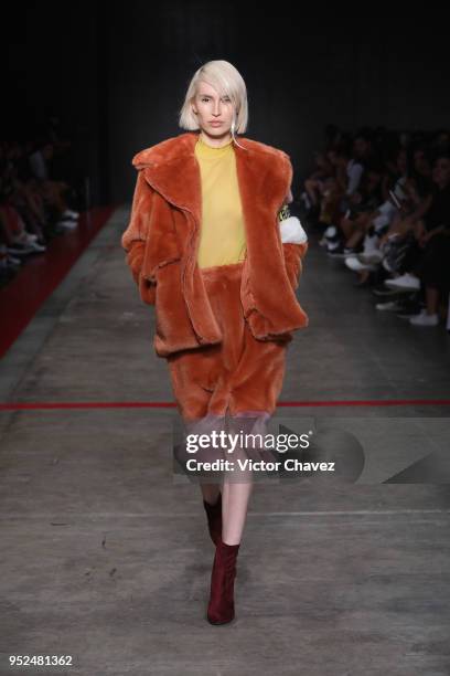 Model walks the runway during the Armando Takeda show at Mercedes Benz Fashion Week Mexico Fall/Winter 2018 at Fronton Mexico on April 26, 2018 in...