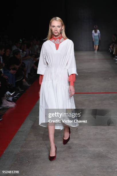 Model walks the runway during the Armando Takeda show at Mercedes Benz Fashion Week Mexico Fall/Winter 2018 at Fronton Mexico on April 26, 2018 in...