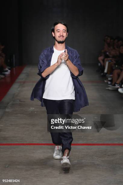 Fashion designer Armando Takeda walks the runway during the day 5 of Mercedes Benz Fashion Week Mexico Fall/Winter 2018 at Fronton Mexico on April...