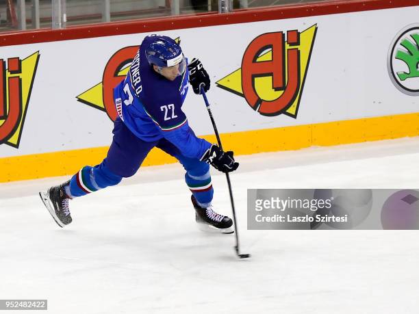 Diego Kostner of Italy shoots on goal during the 2018 IIHF Ice Hockey World Championship Division I Group A match between Italy and Great Britain at...