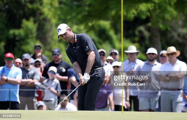 Justin Rose of England chips onto the seventh hole during the third round of the Zurich Classic at TPC Louisiana on April 28, 2018 in Avondale,...