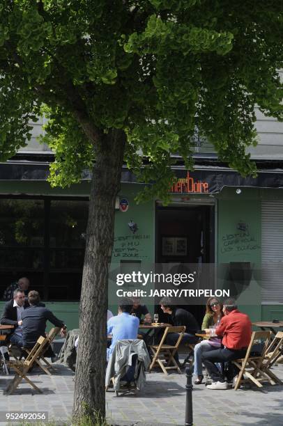 The terrace of La Mer a Boire bar and restaturant located in Rue des Envierges in front of the Parc de Belleville, Belleville and Menilmontant area,...