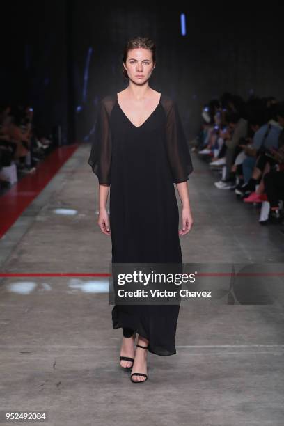 Model walks the runway during the Shinae Park show at Mercedes Benz Fashion Week Mexico Fall/Winter 2018 at Fronton Mexico on April 26, 2018 in...