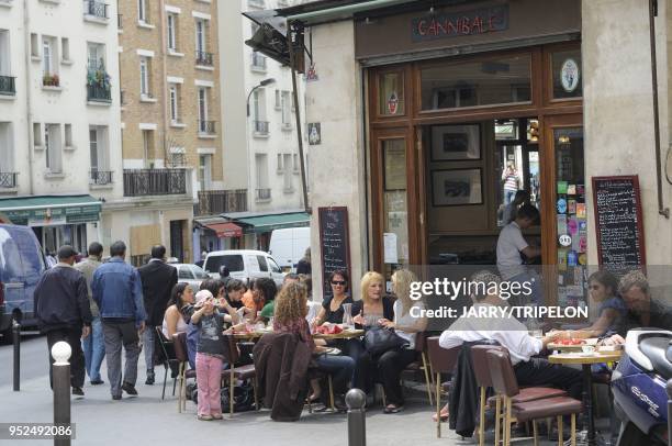 The terrace of Le Cannibale cafe bar and restaurant located Jean Pierre Timbaud street in Belleville and Menilmontant area, 11 th district in Paris,...