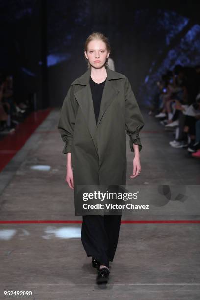 Model walks the runway during the Shinae Park show at Mercedes Benz Fashion Week Mexico Fall/Winter 2018 at Fronton Mexico on April 26, 2018 in...