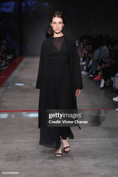 Model walks the runway during the Shinae Park show at Mercedes Benz Fashion Week Mexico Fall/Winter 2018 at Fronton Mexico on April 26, 2018 in...