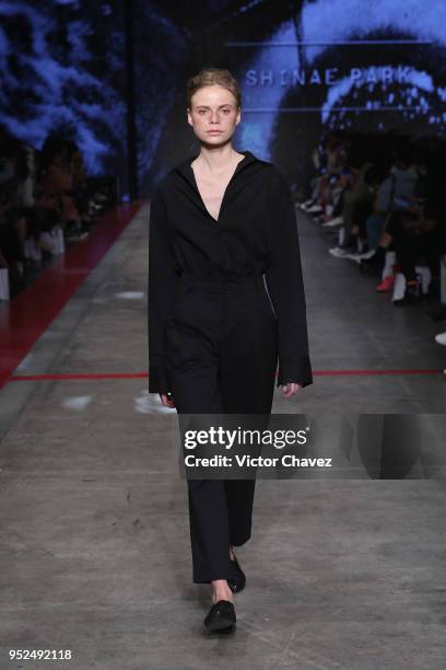 Model walks the runway during the Shinae Park show at Mercedes Benz Fashion Week Mexico Fall/Winter 2018 at Fronton Mexico on April 26, 2018 in...