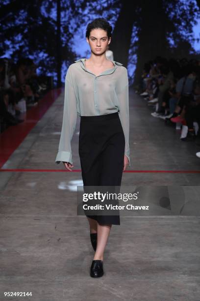 Model walks the runway during the Shinae Park show at Mercedes Benz Fashion Week Mexico Fall/Winter 2018 at Fronton Mexico on April 26, 2018 in...