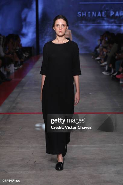 Model walks the runway during the Shinae Park show at Mercedes Benz Fashion Week Mexico Fall/Winter 2018 at Fronton Mexico on April 26, 2018 in...