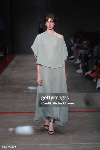 Model walks the runway during the Shinae Park show at Mercedes Benz Fashion Week Mexico Fall/Winter 2018 at Fronton Mexico on April 26, 2018 in...