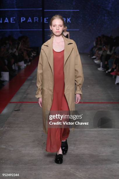 Model walks the runway during the Shinae Park show at Mercedes Benz Fashion Week Mexico Fall/Winter 2018 at Fronton Mexico on April 26, 2018 in...