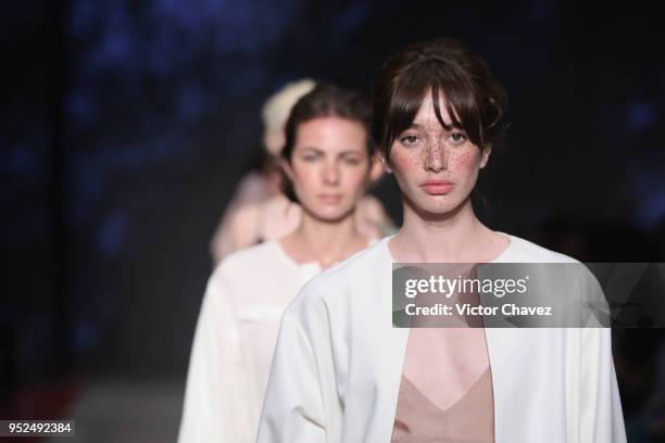 Model walks the runway during the Shinae Park show at Mercedes Benz Fashion Week Mexico Fall/Winter 2018 at Fronton Mexico on April 26, 2018 in...