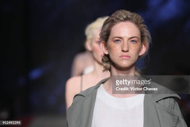 Model walks the runway during the Shinae Park show at Mercedes Benz Fashion Week Mexico Fall/Winter 2018 at Fronton Mexico on April 26, 2018 in...