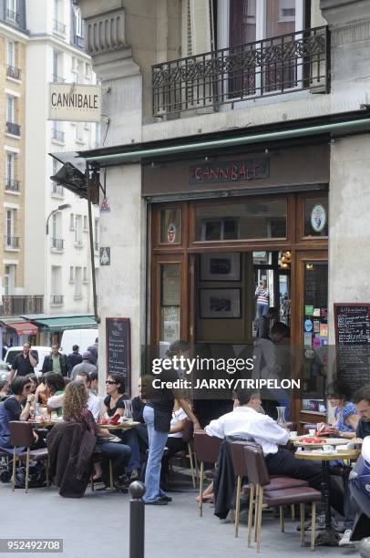 The terrace of Le Cannibale cafe bar and restaurant located Jean Pierre Timbaud street in Belleville and Menilmontant area, 11 th district in Paris,...