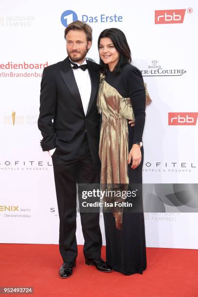 German actress Jasmin Tabatabai and her husband Andreas Pietschmann attend the Lola - German Film Award red carpet at Messe Berlin on April 27, 2018...