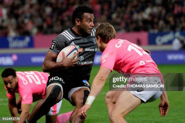 Brive's Fijian centre Seremaia Burotu runs with the ball during the French Top 14 rugby union match between Paris Stade Francais and Brive CAB on...