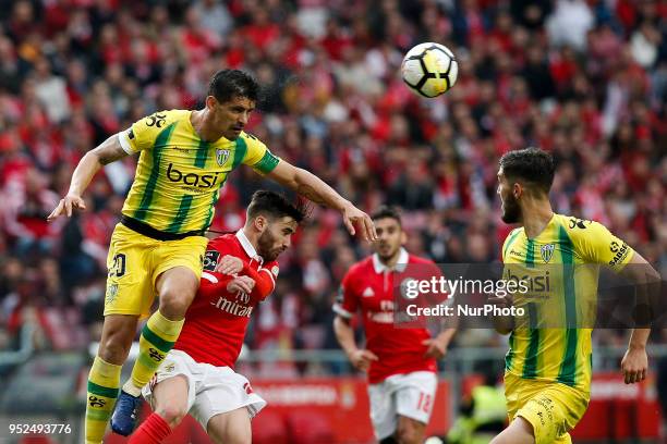 Tondela's defender Ricardo Costa vies for the ball with Benfica's midfielder Rafa Silva during the Portuguese League football match between SL...