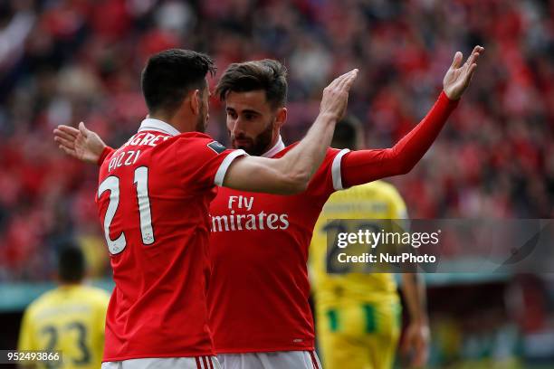 Benfica's forward Pizzi celebrates his goal with Benfica's midfielder Rafa Silva during the Portuguese League football match between SL Benfica and...