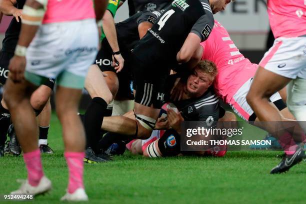 Peet Marais is tackled during the French Top 14 rugby union match between Paris Stade Francais and Brive CAB on April 28, 2018 at the Jean Bouin...