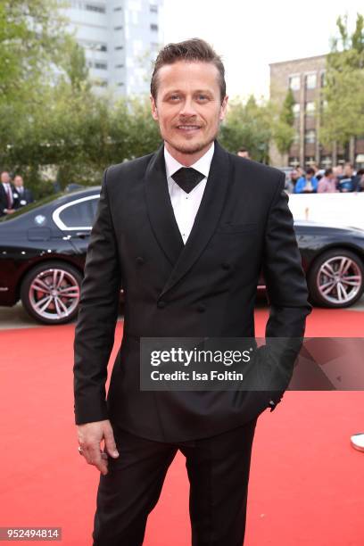 German actor Roman Knizka attends the Lola - German Film Award red carpet at Messe Berlin on April 27, 2018 in Berlin, Germany.