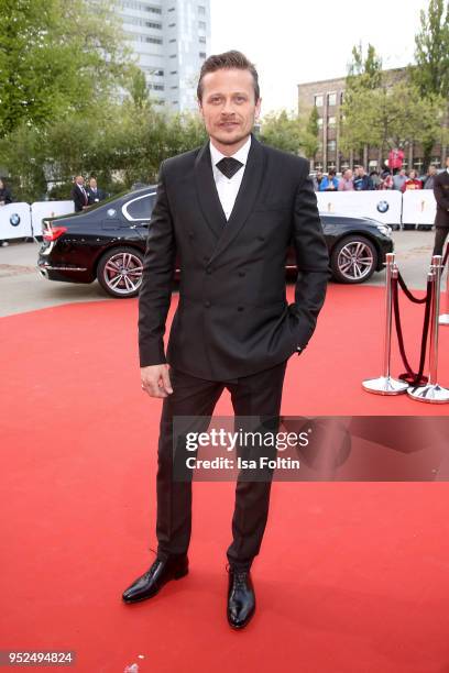 German actor Roman Knizka attends the Lola - German Film Award red carpet at Messe Berlin on April 27, 2018 in Berlin, Germany.