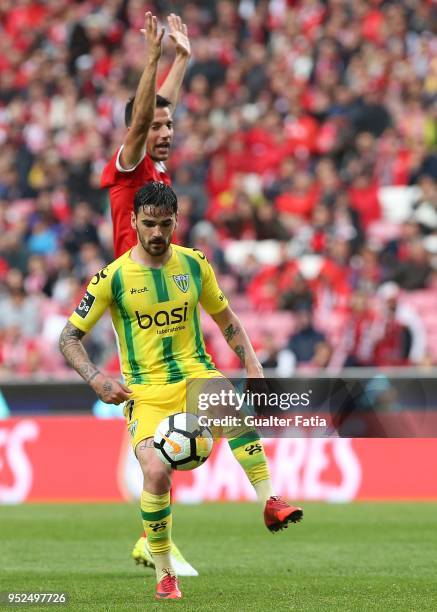 Tondela midfielder Claude Goncalves from Portugal with SL Benfica midfielder Andreas Samaris from Greece in action during the Primeira Liga match...