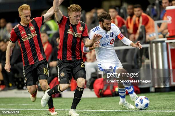 Chris McCann of Atlanta United , Julian Gressel of Atlanta United , Ignacio Piatti of Montreal Impact during the match between Atlanta United FC v...