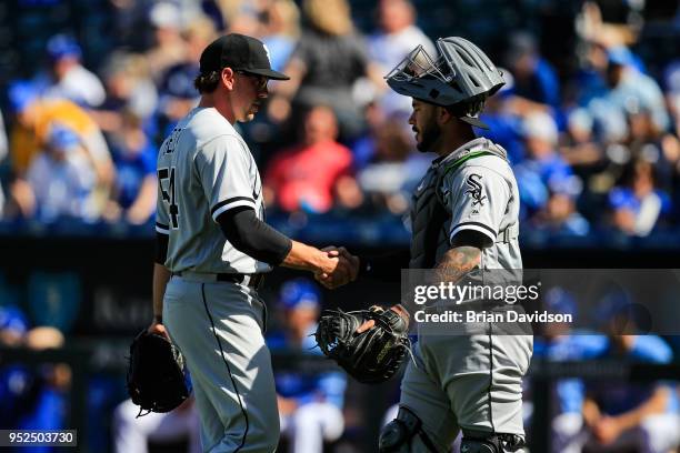 Chris Beck and Welington Castillo of the Chicago White Sox celebrate the win over the Kansas City Royals during game one of a doubleheader at...