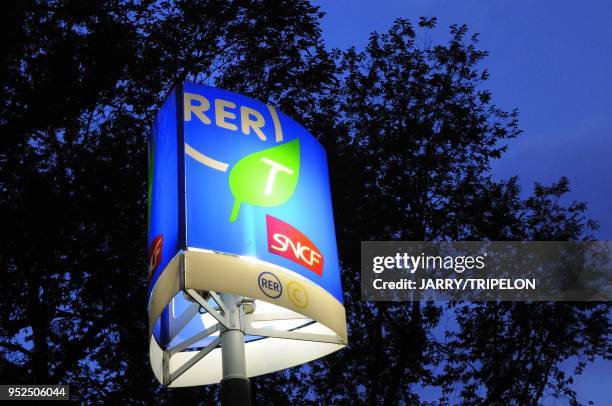 And SNCF electric sign by night at the Invalides subway station in Paris, Ile de France region, France.