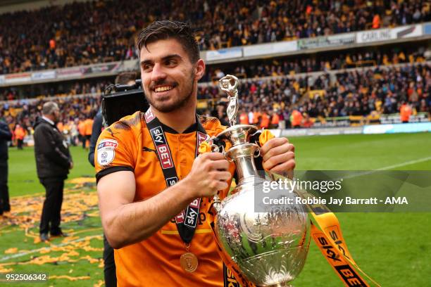 Ruben Neves of Wolverhampton Wanderers lifts the Sky Bet Championship trophy during the Sky Bet Championship match between Wolverhampton Wanderers...