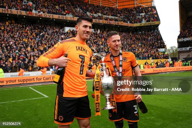 Danny Batth of Wolverhampton Wanderers and Barry Douglas of Wolverhampton Wanderers celebrate with the Sky Bet Championship trophy during the Sky Bet...