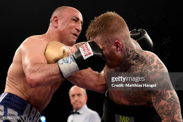 Arthur Abraham of Germany and Patrick Nielsen of Denmark exchange punches during their WBO international super middleweight title fight at...