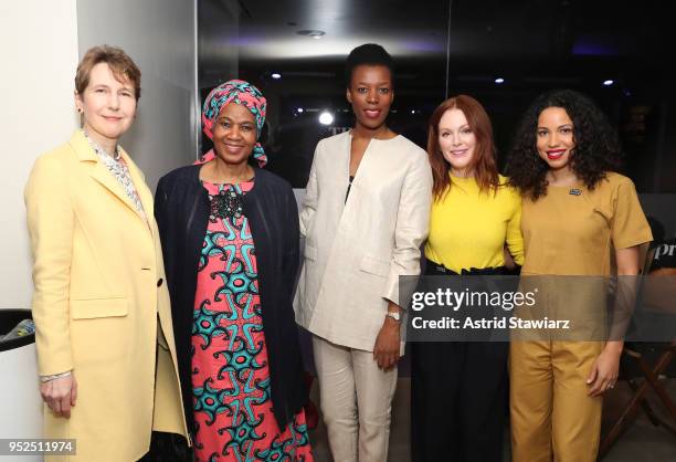 Phumzile Mlambo-Ngcuka, Julianne Moore and Jurnee Smollett-Bell pose with guests at "Time's Up" during the 2018 Tribeca Film Festival at Spring...