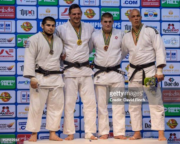 Over 100kg medallists L-R: Silver; Tamerlan Bashaev , Gold; Lukas Krpalek , Bronzes; Stephan Hegyi and Henk Grol during day three of the 2018 Tel...