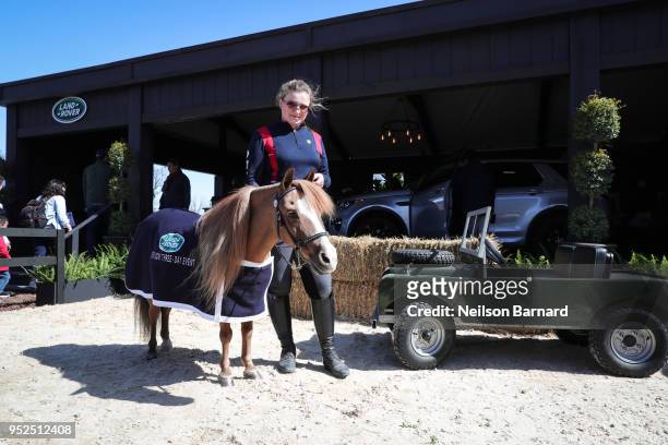 Patrick the miniature pony at the "Land Rover Ultimate Stable experience," featuring the Land Rover Discovery Sport at the Land Rover Kentucky Three...