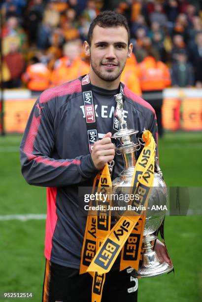 Leo Bonatini of Wolverhampton Wanderers celebrates with the EFL Sky Bet Championship trophy after the Sky Bet Championship match between...