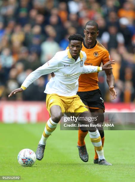 Lucas Joao of Sheffield Wednesday and Willy Boly of Wolverhampton Wanderers during the Sky Bet Championship match between Wolverhampton Wanderers and...