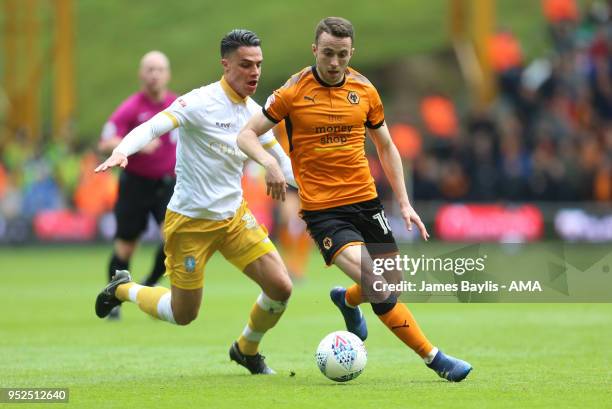 Diogo Jota of Wolverhampton Wanderers and Joel Pelupessy of Sheffield Wednesday during the Sky Bet Championship match between Wolverhampton Wanderers...