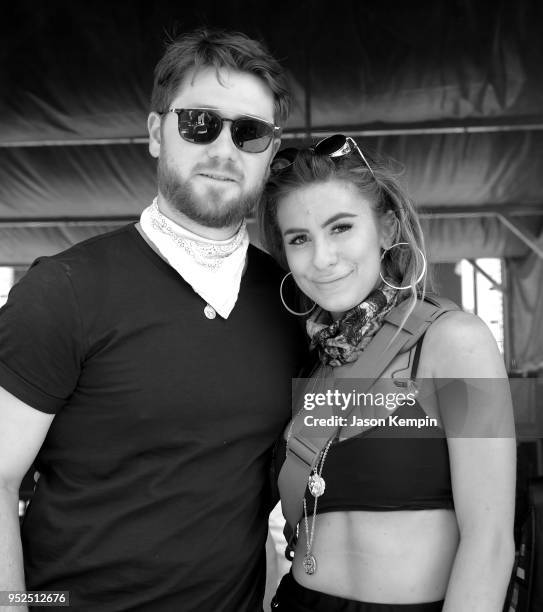 Adam Doleac and Kassi Ashton pose backstage during 2018 Stagecoach California's Country Music Festival at the Empire Polo Field on April 28, 2018 in...