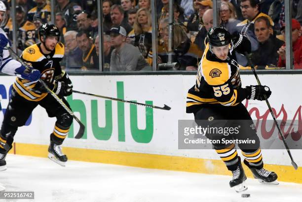 Boston Bruins right wing Noel Acciari grabs the puck during Game 5 of the First Round for the 2018 Stanley Cup Playoffs between the Boston Bruins and...