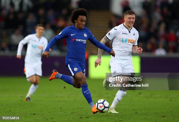 Willian of Chelsea in action during the Premier League match between Swansea City and Chelsea at Liberty Stadium on April 28, 2018 in Swansea, Wales.